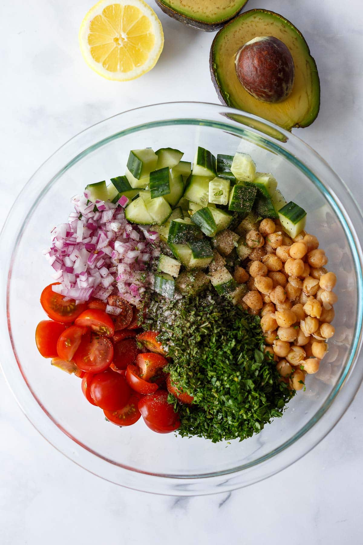 Ingredients in a bowl for Chickpea Salad.