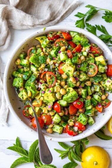 This Chickpea Salad is quick, easy and full of fresh flavors and crunchy texture. Made in one bowl with a simple lemon olive oil dressing, everything comes together in about 20 minutes!