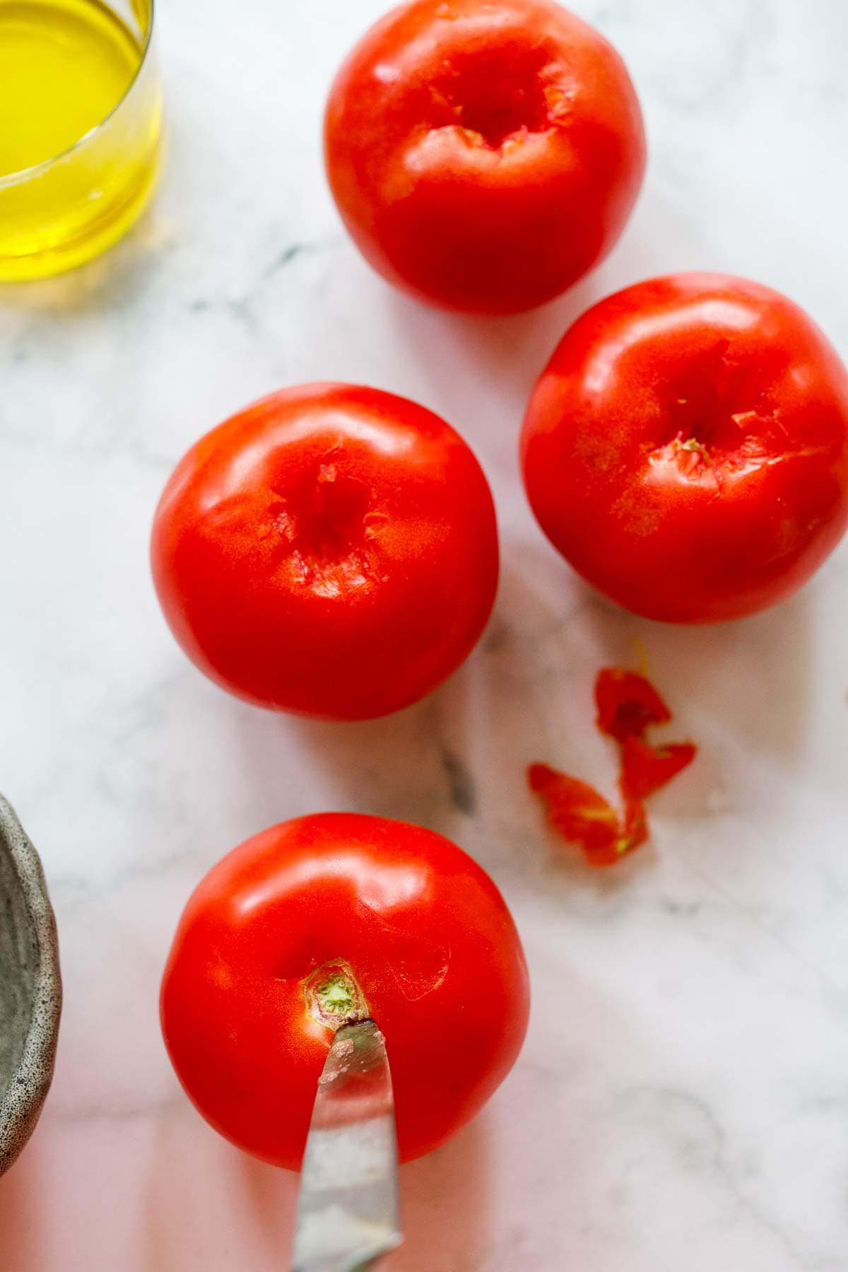 coring the tomatoes.