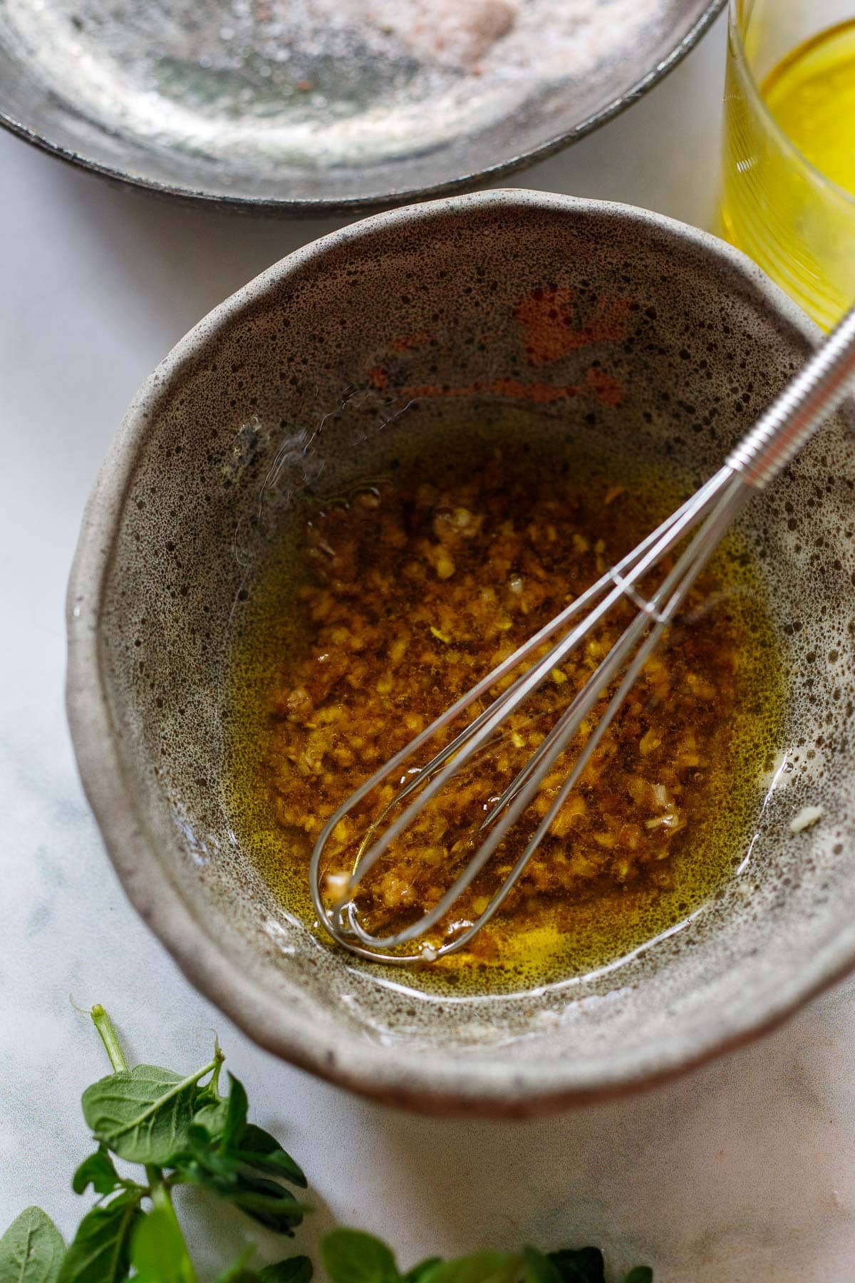 whisking the marinade.