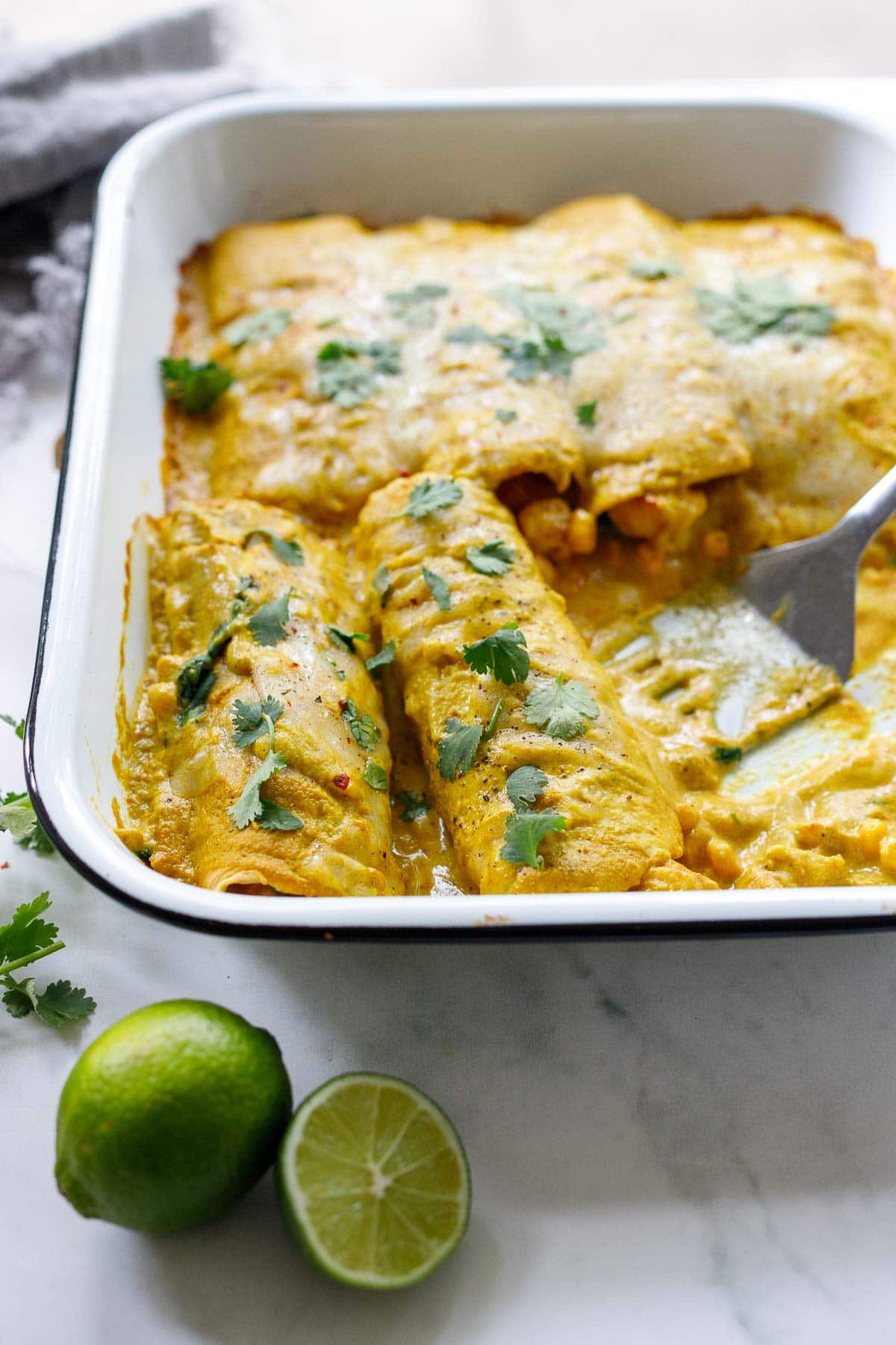 Shrimp enchiladas with yellow mole sauce