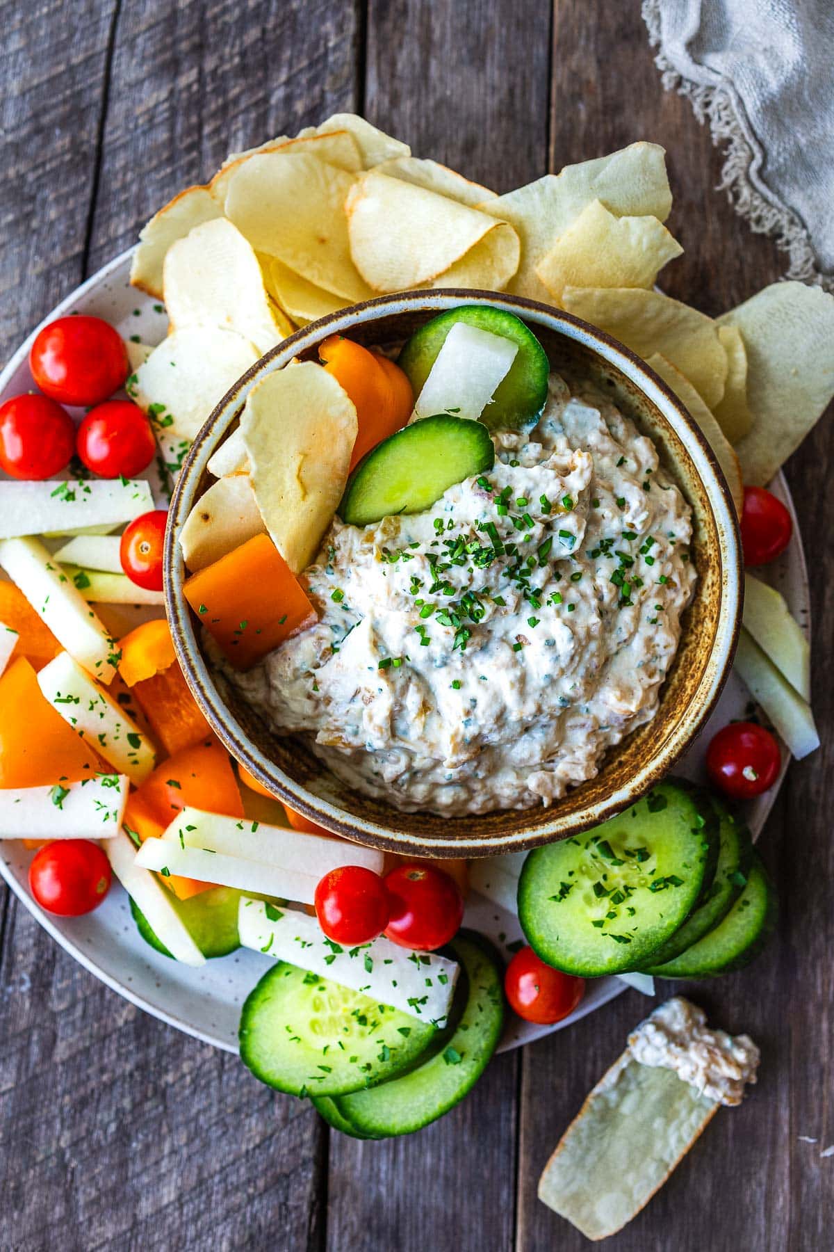 French onion dip with veggies, and potato chips.