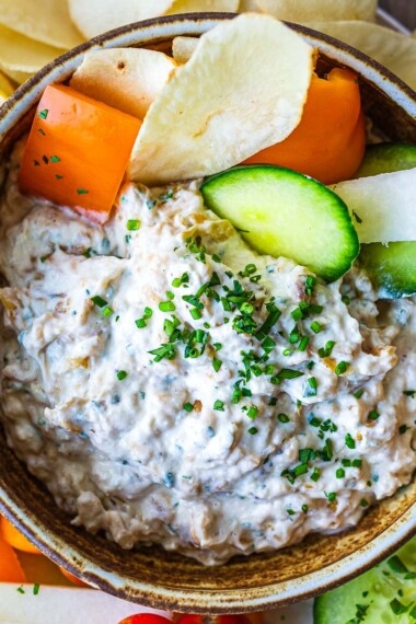 A delicious healthy take on French Onion Dip made with caramelized onions, creamy Greek yogurt, and fresh herbs. A perfect make ahead appetizer for potlucks and parties.