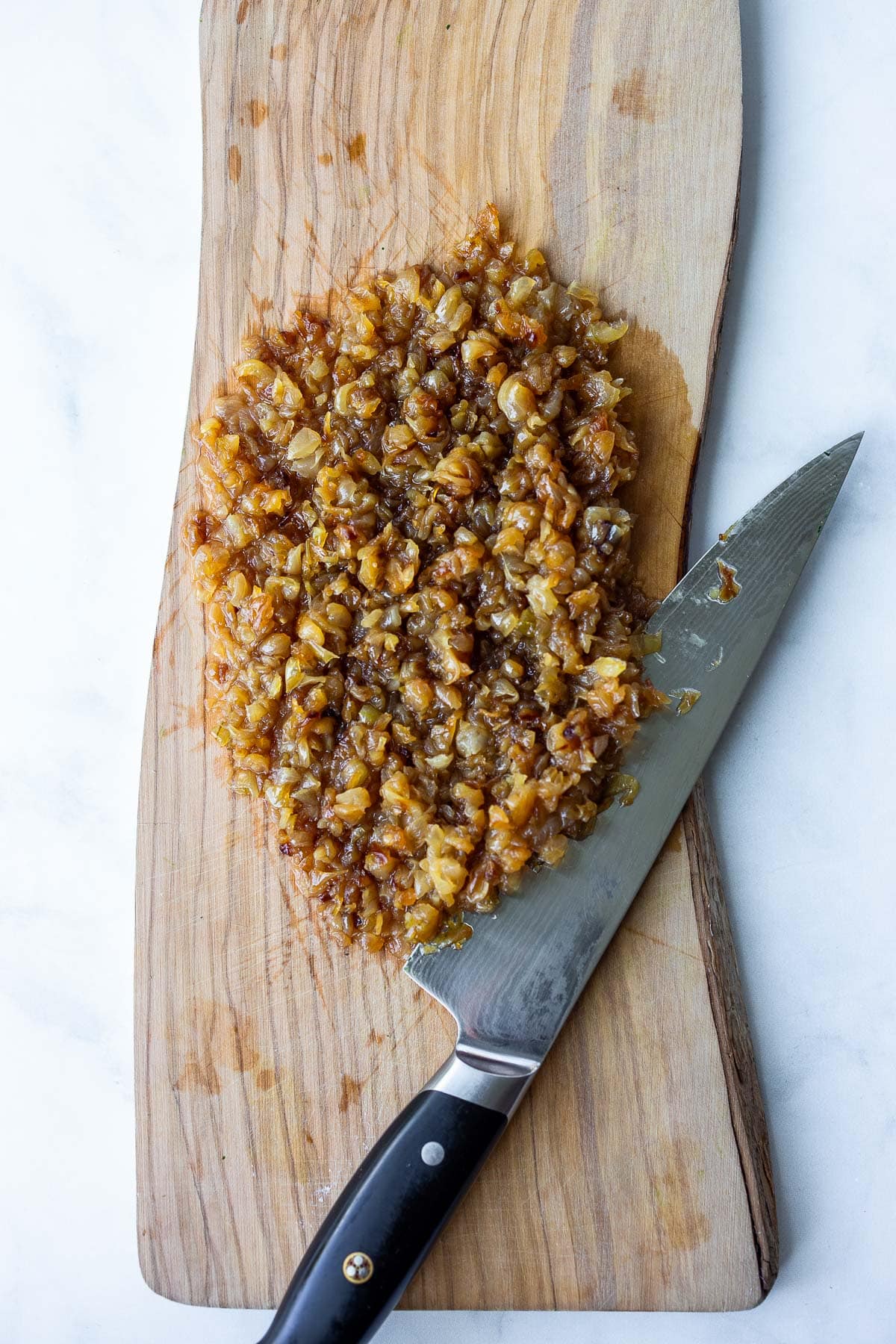 Diced caramelized onions.