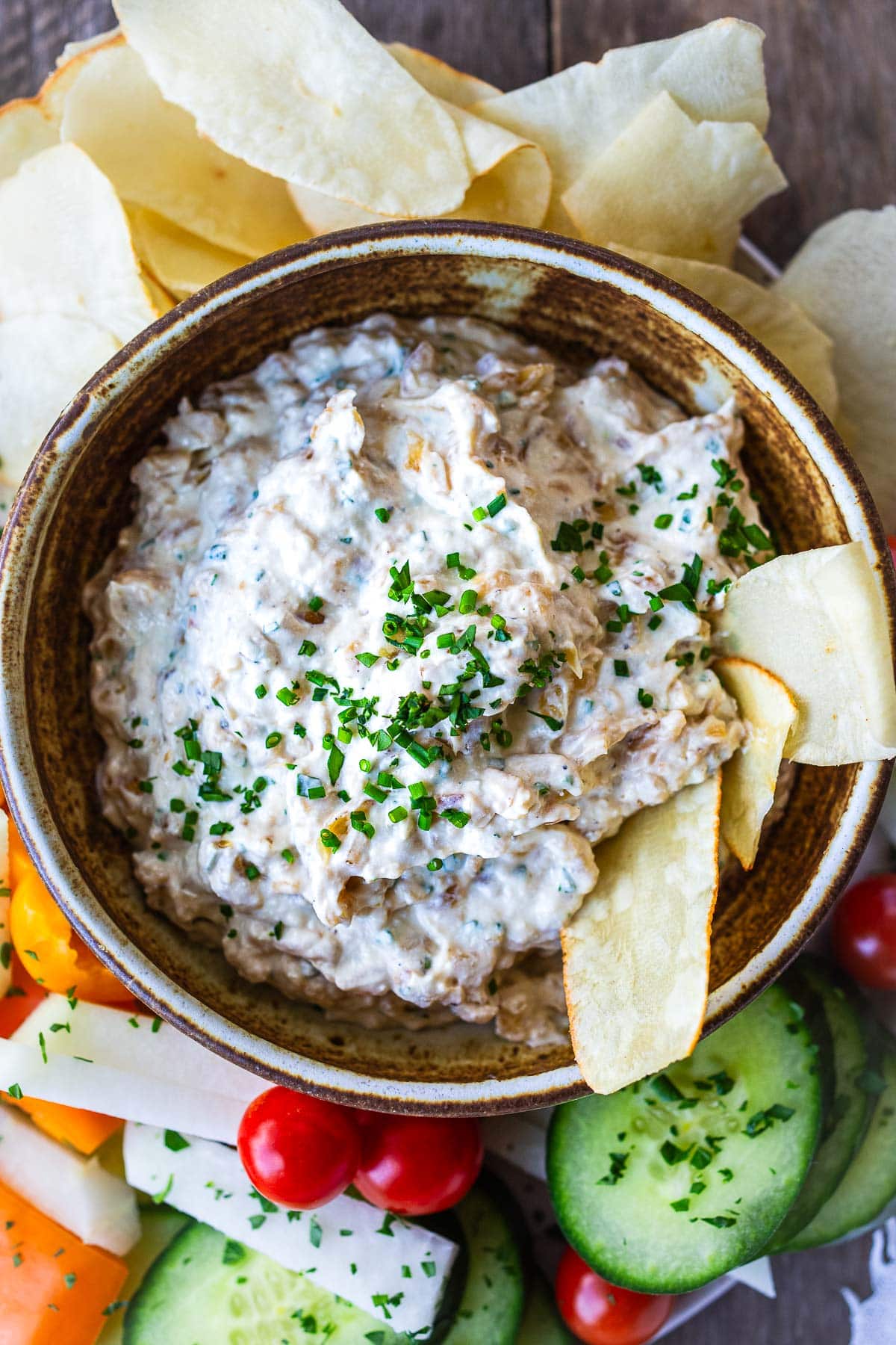 A delicious healthy take on French Onion Dip made with caramelized onions, creamy Greek yogurt, and fresh herbs. A perfect make ahead appetizer for potlucks and parties.