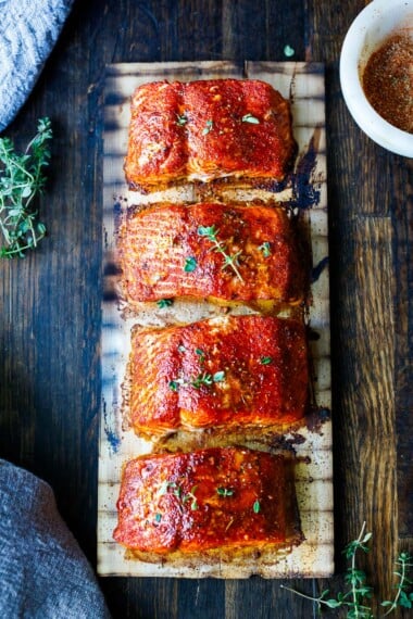 The smoky flavor of cedar helps make this salmon dish the easiest and tastiest you've ever made! Cedar Plank Salmon is easy, delicious and healthy! Salmon is infused with subtle smoke using a cedar plank on the grill—no fuss, with easy clean up.