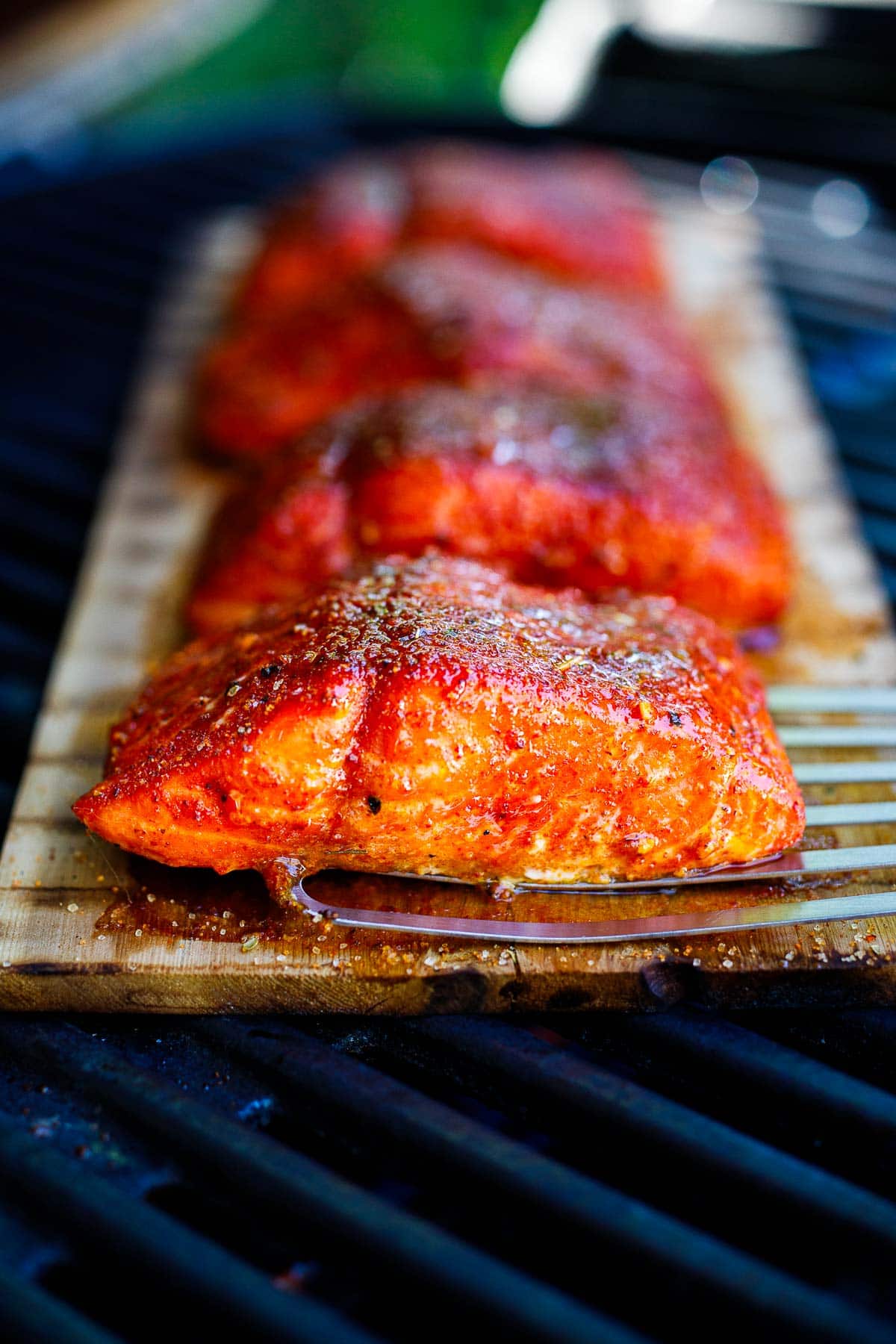 The smoky flavor of cedar helps make this salmon dish the easiest and tastiest you've ever made! Cedar Plank Salmon is easy, delicious and healthy! Salmon is infused with subtle smoke using a cedar plank on the grill—no fuss, with easy clean up.