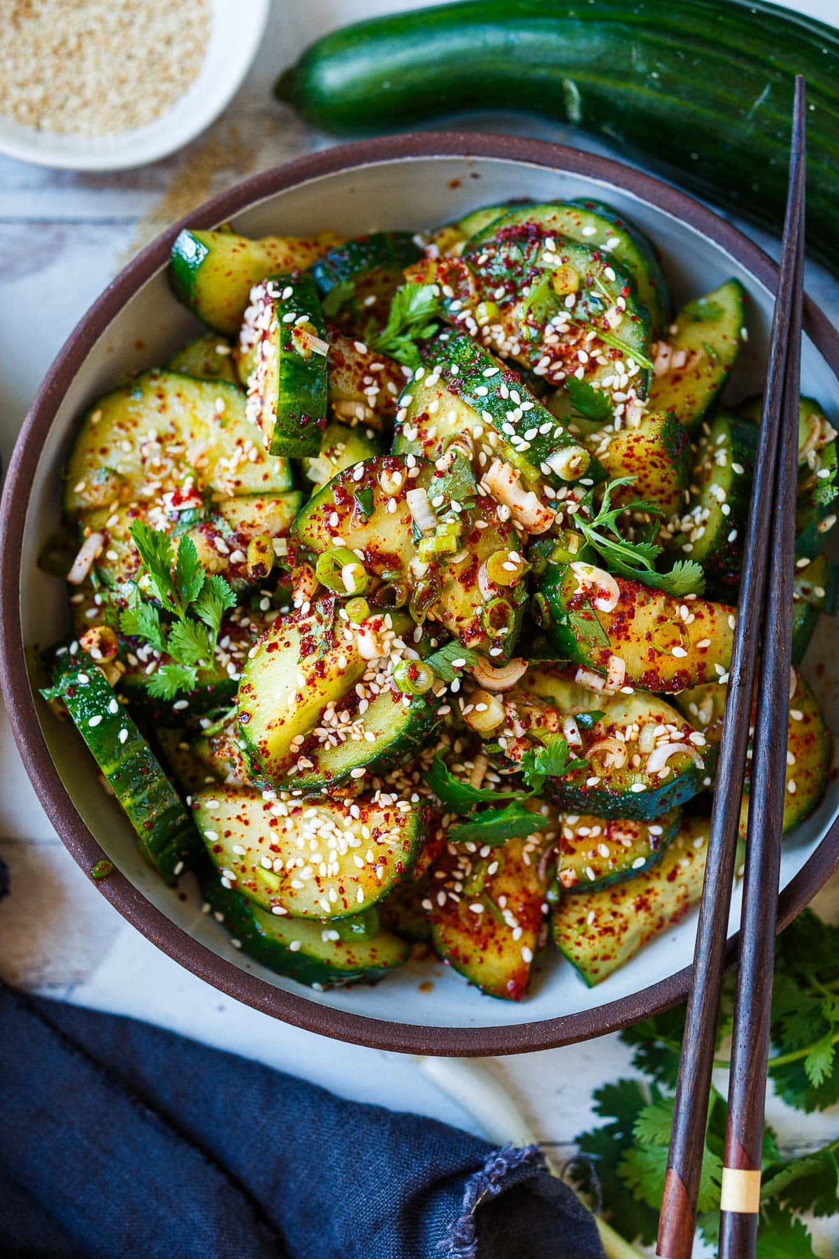 Korean Cucumber Salad (in a bowl with chop sticks