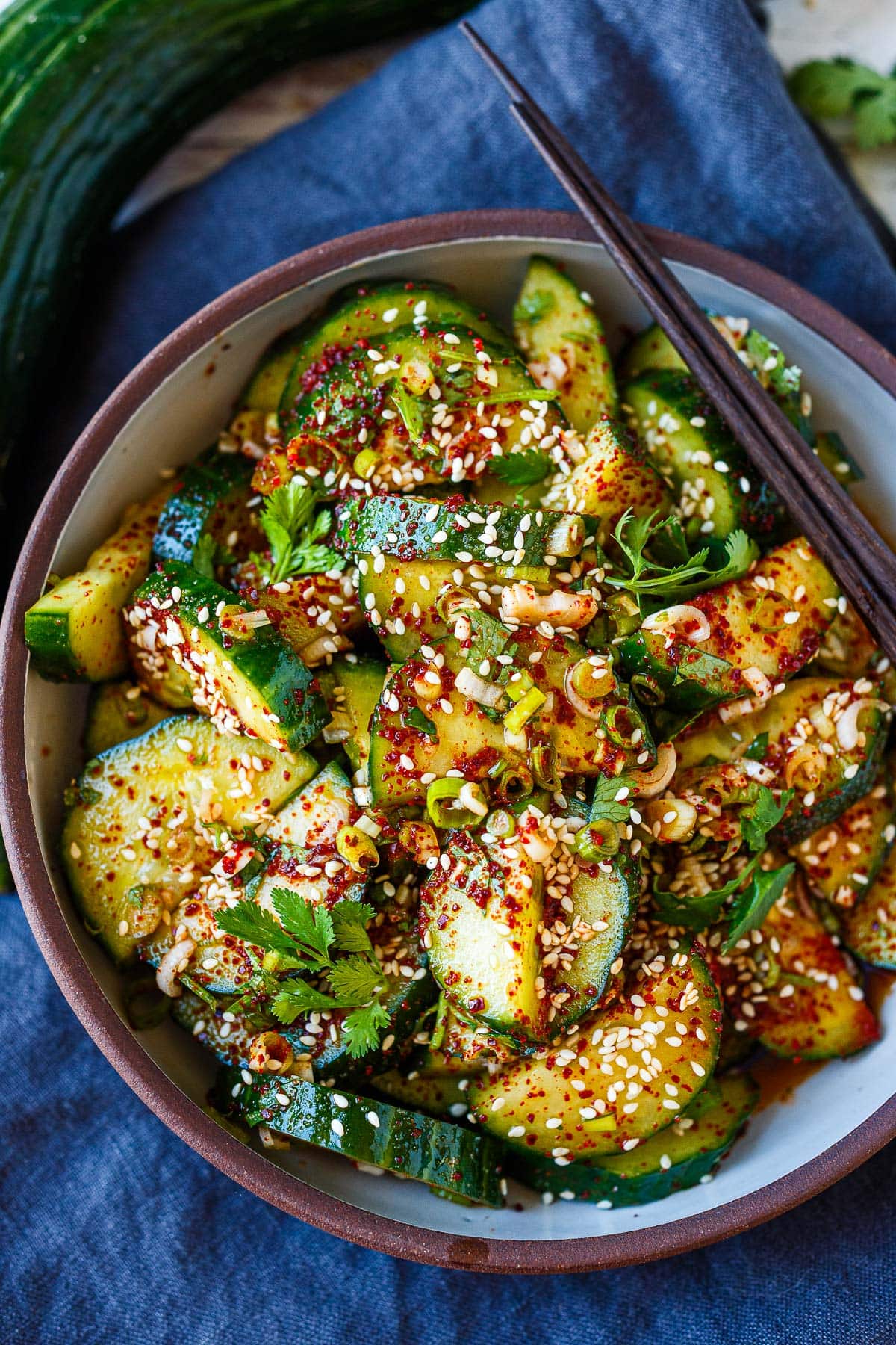 Tangy spicy Korean Cucumber Salad (Oi Muchim) is crunchy, cool, and refreshing. An easy-to-make Korean cucumber side dish that is healthy and delicious.