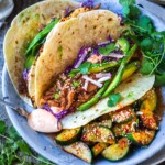 Take taco night to the next level! Korean Tacos with chicken bulgogi are so incredibly flavorful-succulent, marinated chicken is sauteed until tender and topped with fresh avocado, cabbage, and a creamy gochujang taco sauce.