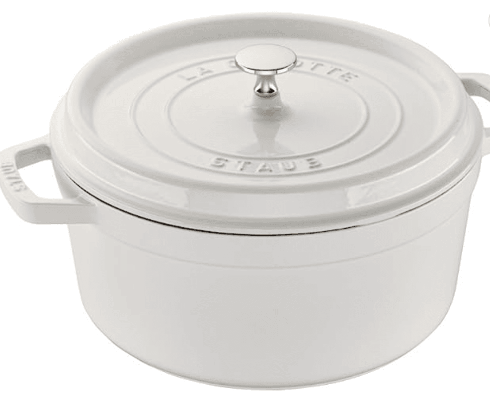 Staub 7-quart dutch oven in white with gold nob.