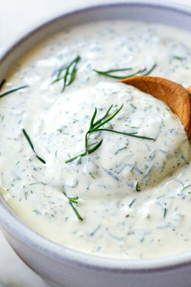 This luscious creamy Dill Sauce is fresh and flavorful- perfect for salmon, veggies, or use it as a dip. It's made with simple ingredients and only takes only 5 minutes to make.