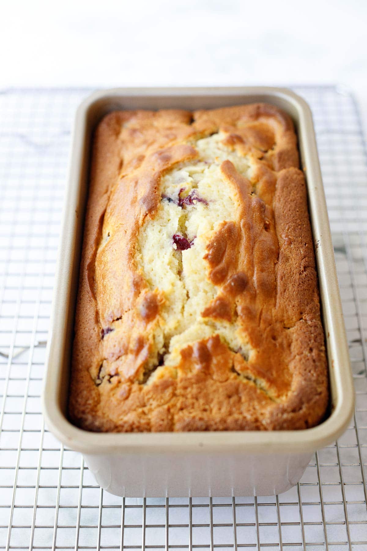 Baked cake on a cooling rack. 