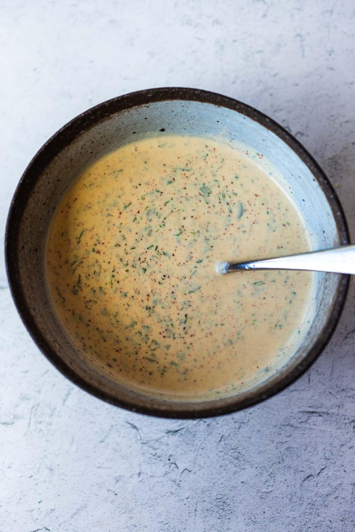Blend Chipotle Ranch Dressing until creamy in a bowl.