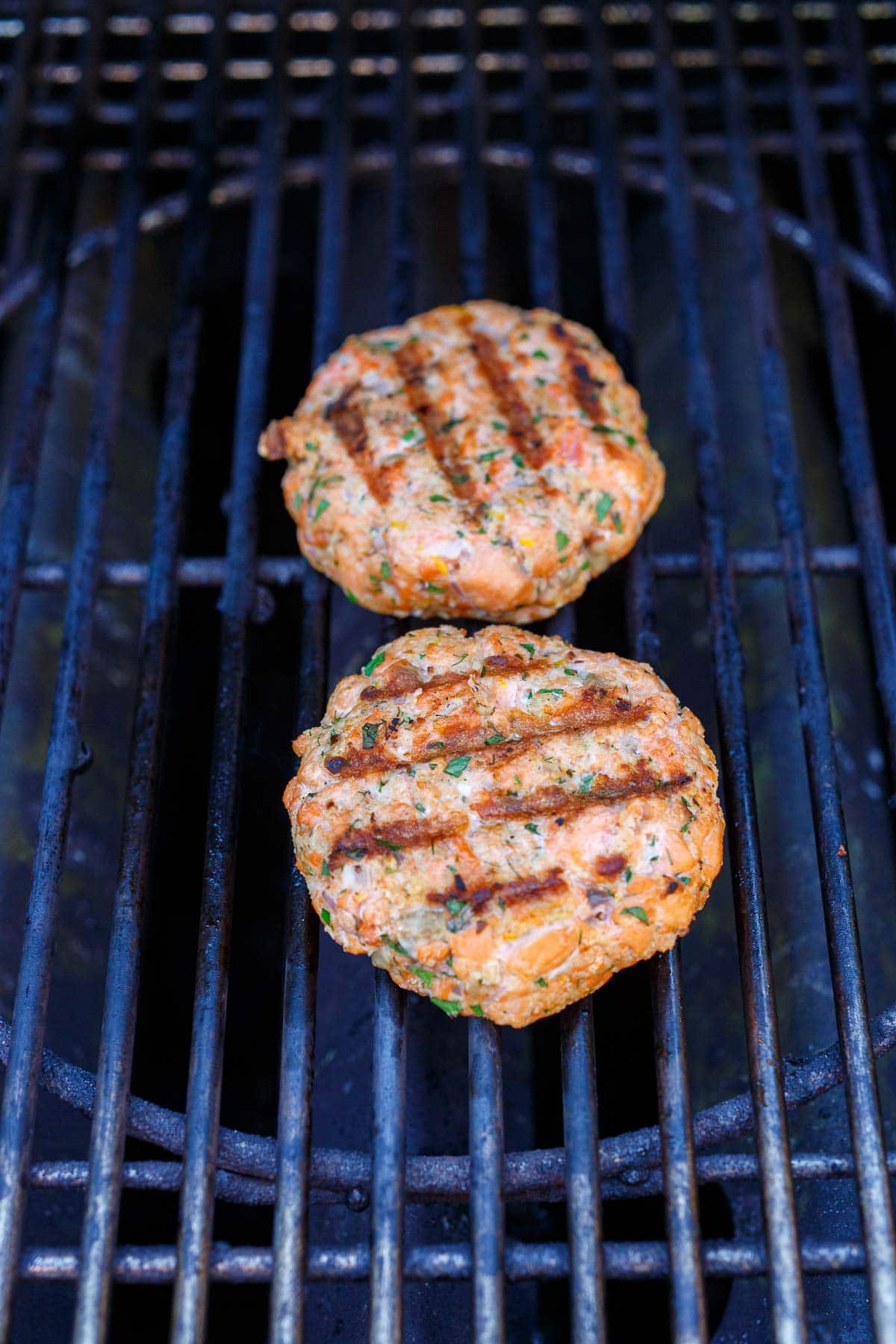 Salmon burgers on the grill.