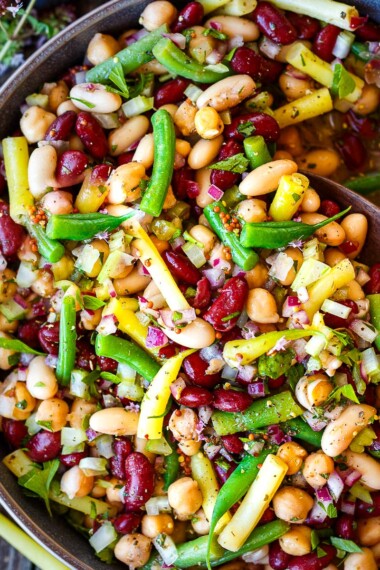 This classic Three Bean Salad recipe is full of tangy flavor, fiber and lots of plant protein! An easy make-ahead side dish for picnics, potlucks, and BBQs. Vegan and Gluten-Free.
