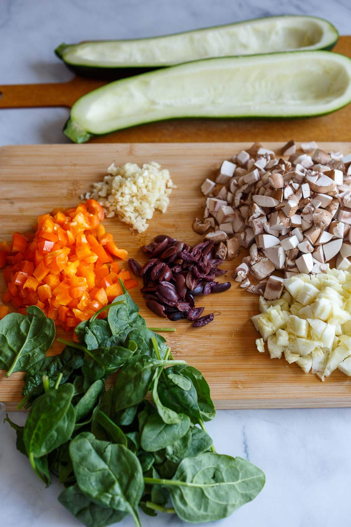 Ingredients for stuffed zucchini chopped.