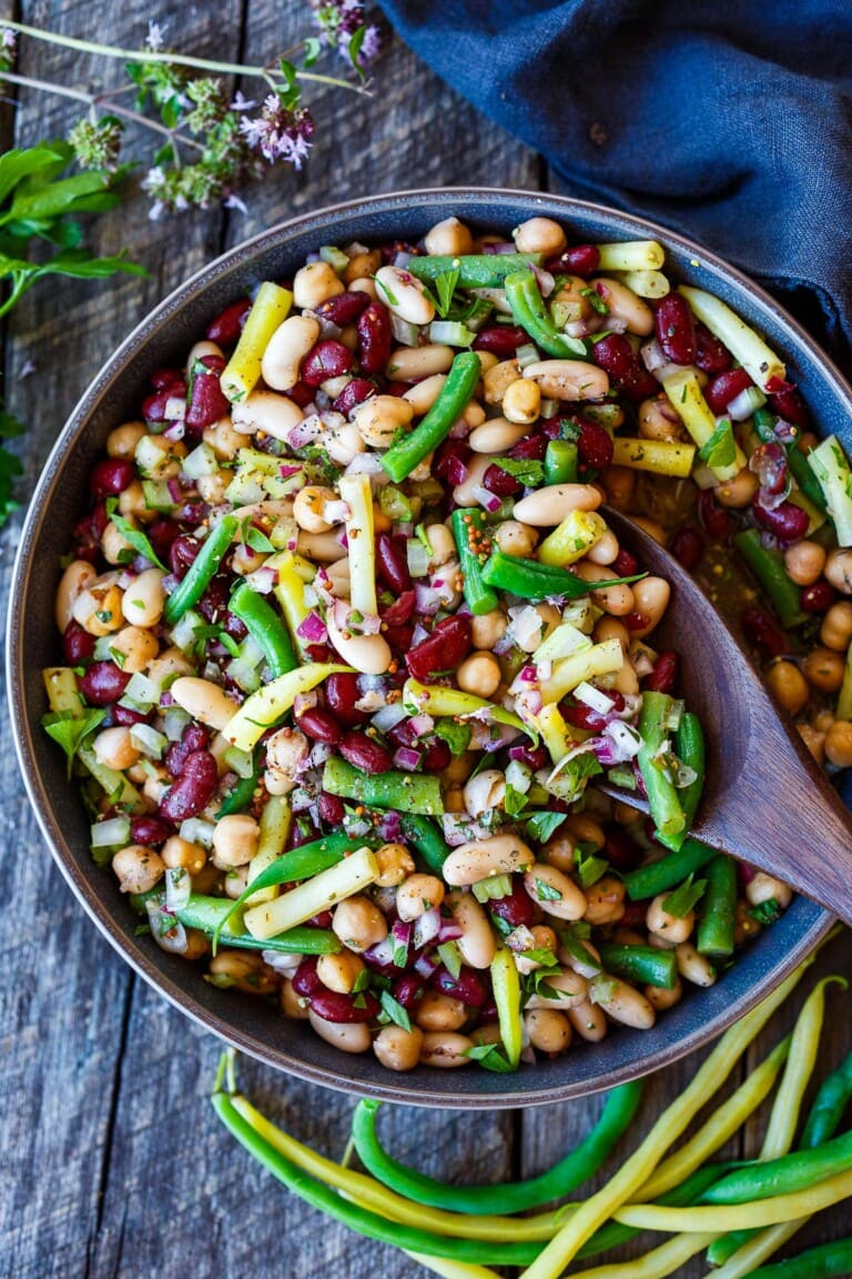 This classic Three Bean Salad recipe is full of tangy flavor, fiber and lots of plant protein! An easy make-ahead side dish for picnics, potlucks, and BBQs. Vegan and Gluten-Free.