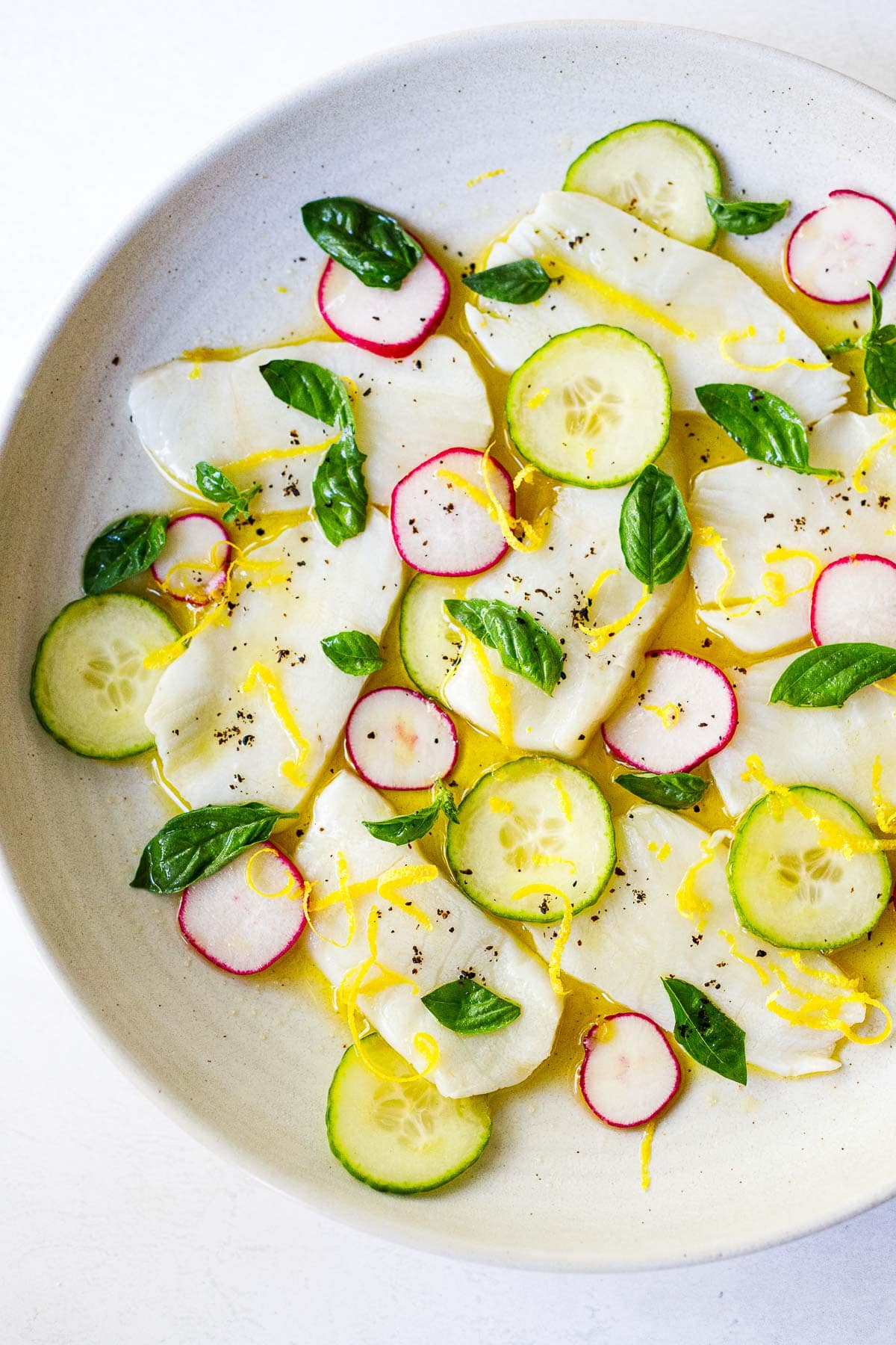 hamachi crudo with cucumber, radish, basil, and lemon zest