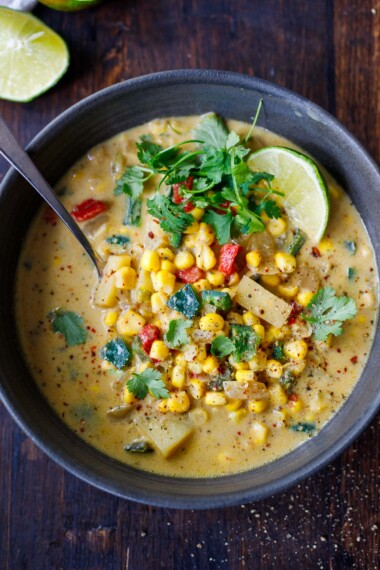 Heart-warming Poblano Corn Chowder is creamy, vegan and full of summertime flavor. Corn, potatoes, and poblano peppers with Mexican spices, in a creamy vegan base. Easy to make and deliciously addicting.