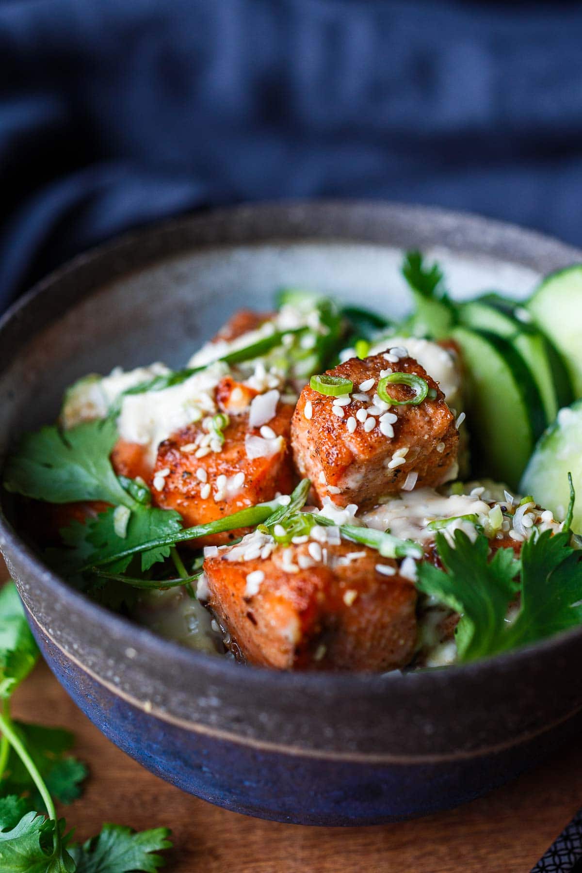 Succulent and flavorful, Air Fryer Salmon Bites are served with a miso ginger dipping sauce and ready in about 15 minutes! Perfect for appetizers, bowls, salads, and snacks! Gluten-free.