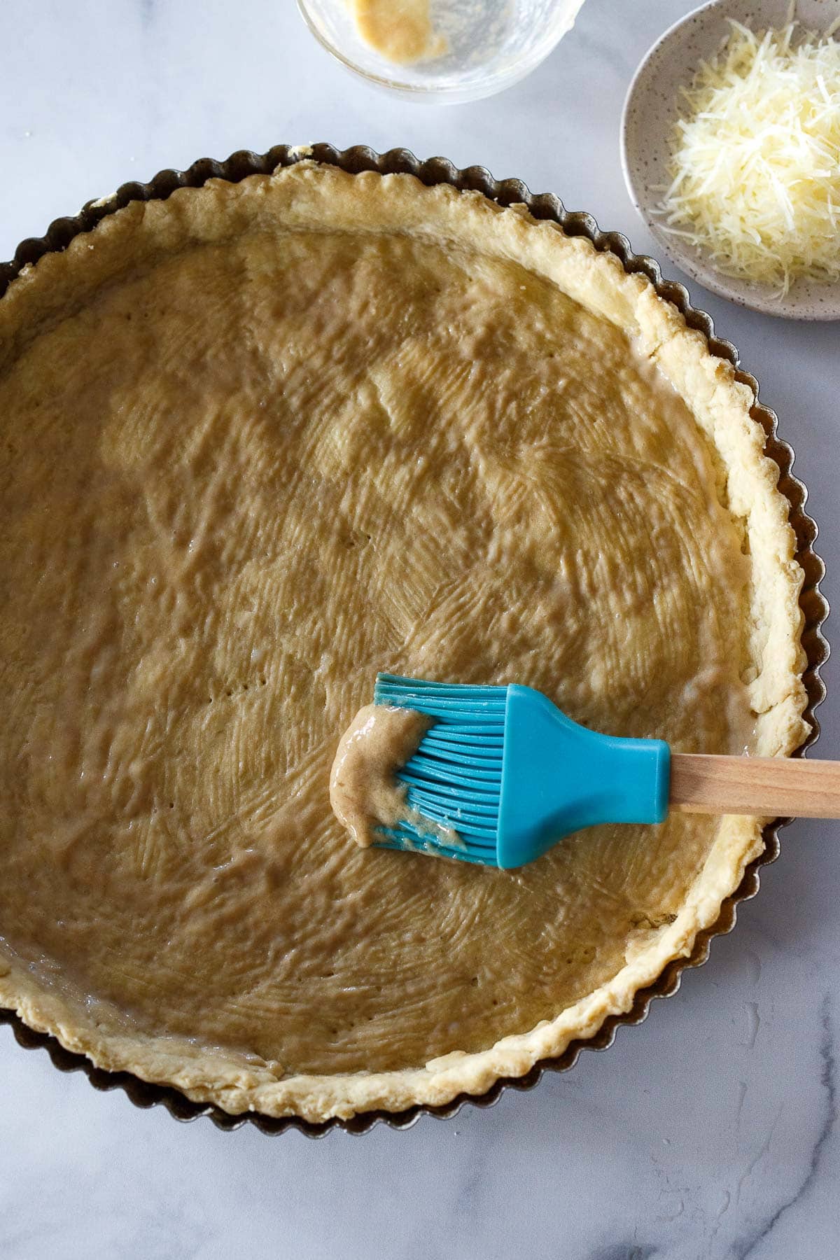 Tart crust with brush for Tomato Tart.