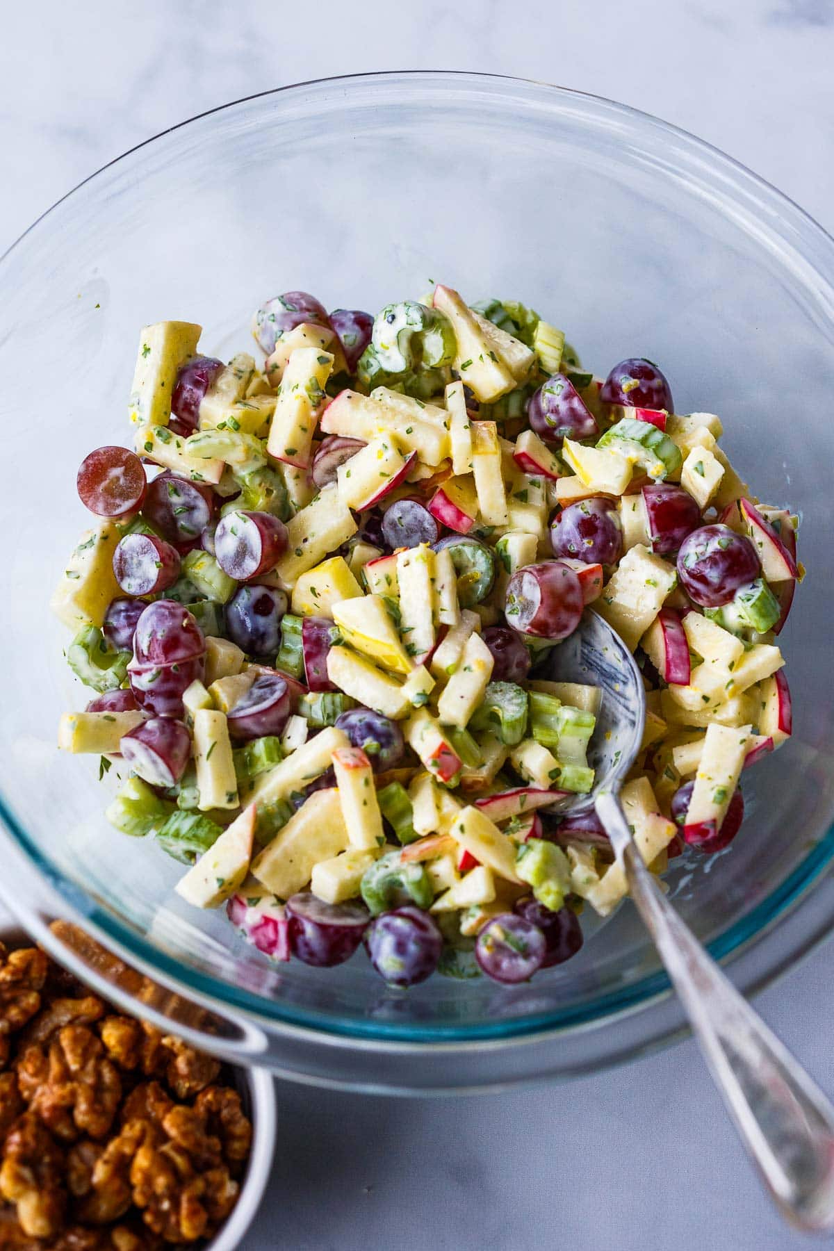 Ingredients mixed together for Waldorf Salad.