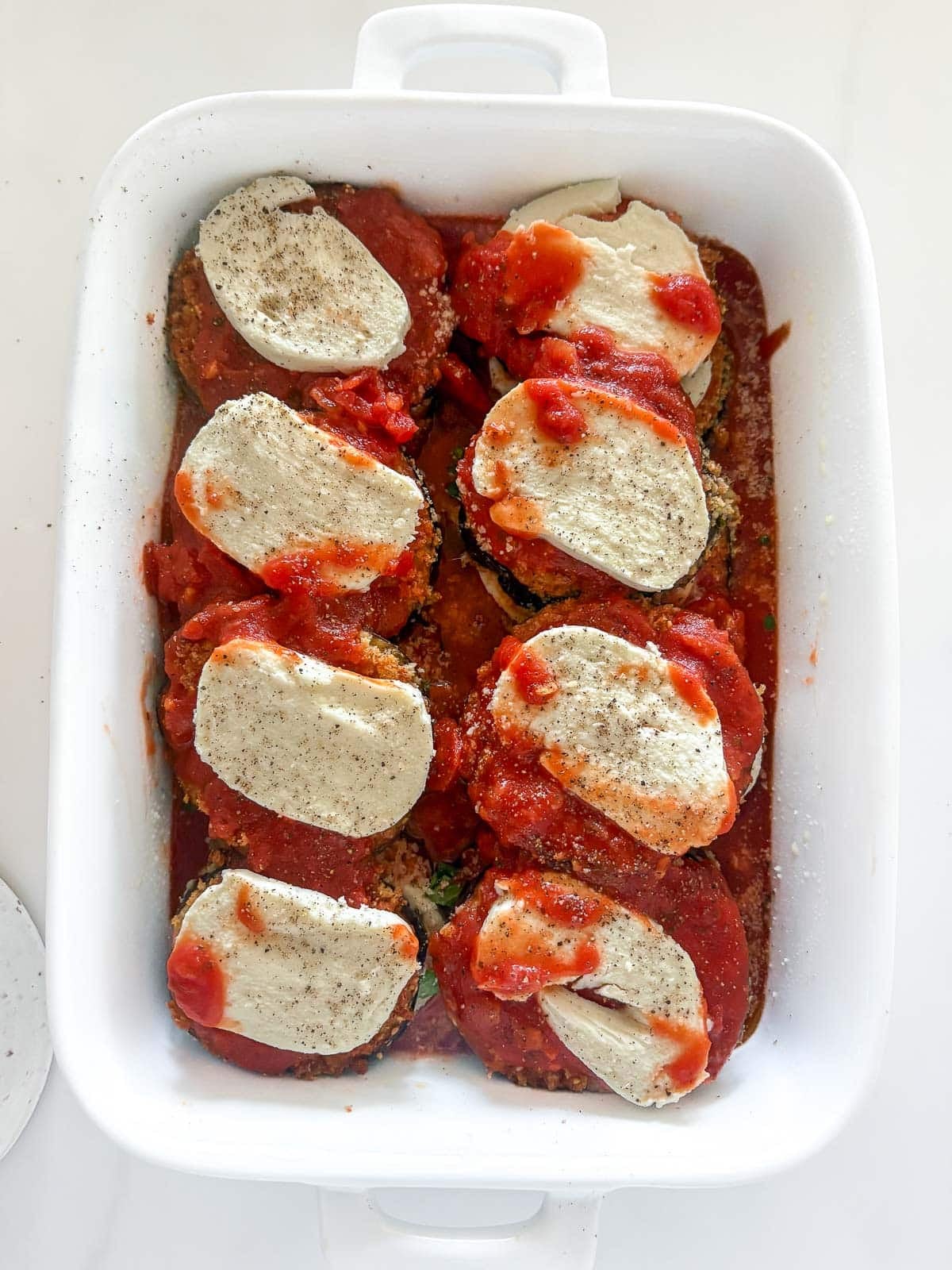 final layer of eggplant parmesan, topped with mozzerella