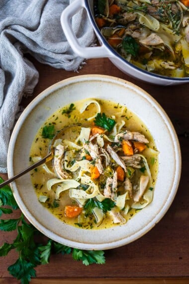 Homemade Chicken Noodle Soup is easy to make and the ultimate comfort food full of immune boosting properties. Healthy, satisfying and comes together in less than an hour!