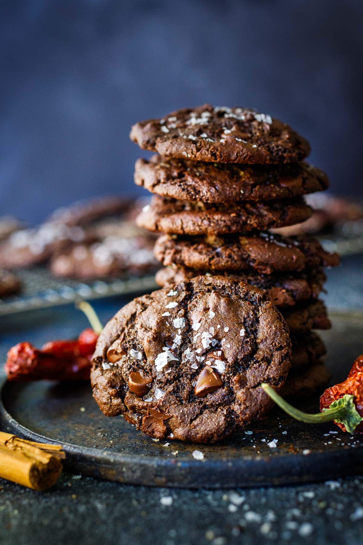 Spicy Double Chocolate Chip Cookies stacked on a plate.