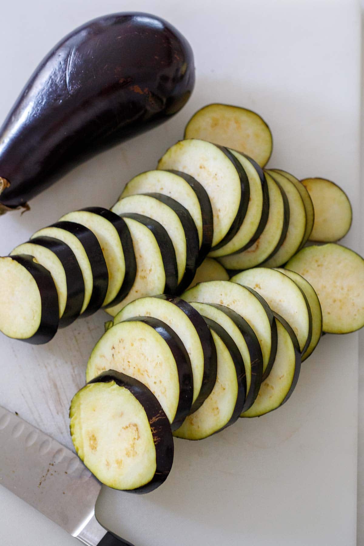 eggplant slices on cutting board