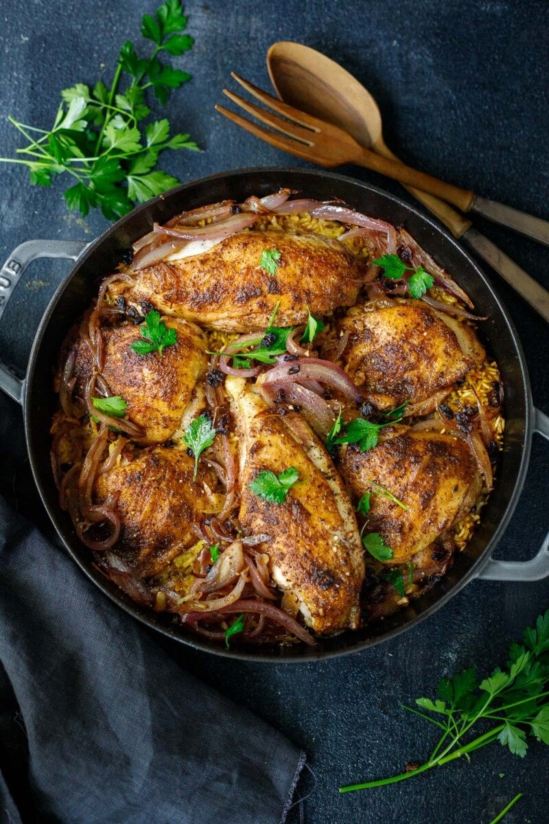 This Persian Chicken recipe is so flavorful and comforting! The savory, tender chicken and basmati rice are infused with fragrant Baharat spice - a delightful one-pan dinner that comes together quickly and easily!