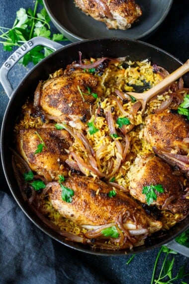 This Persian Chicken recipe is so flavorful and comforting! The savory, tender chicken and basmati rice are infused with fragrant Baharat spice - a delightful one-pan dinner that comes together quickly and easily!