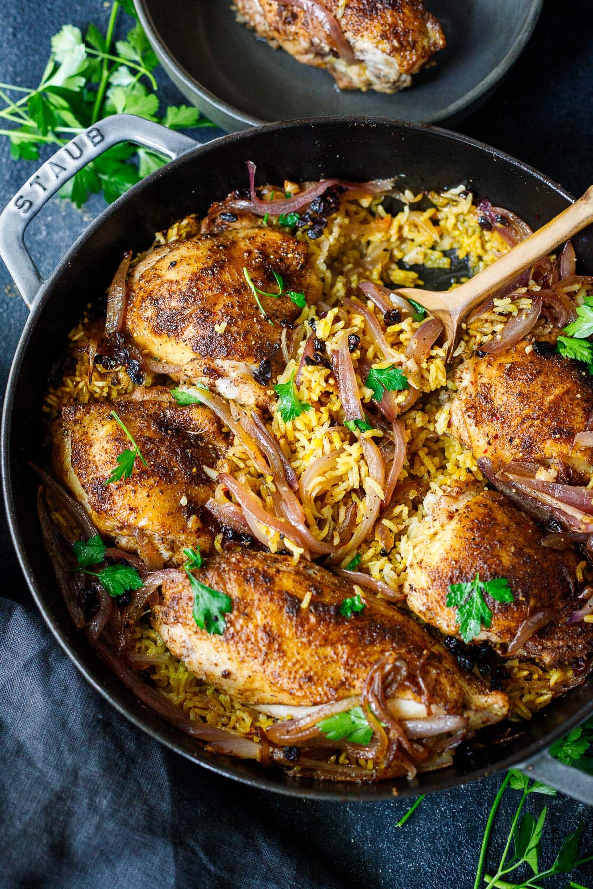 This Persian Chicken recipe is so flavorful and comforting! The savory, tender chicken and basmati rice are infused with fragrant Baharat spice - a delightful one-pan dinner that comes together quickly and easily!