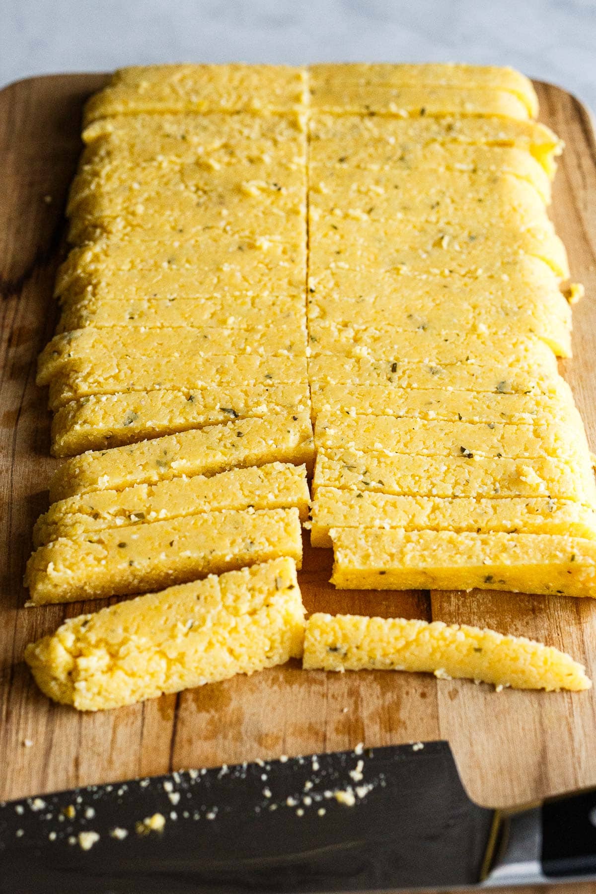 Polenta cut into fry shapes.