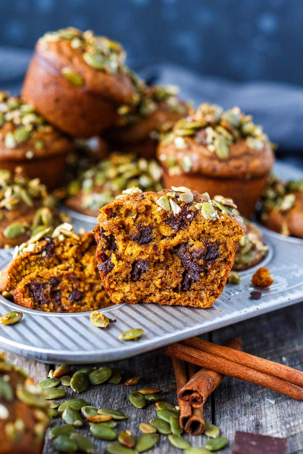 Pumpkin Chocolate Chip Muffins on a muffin tin.