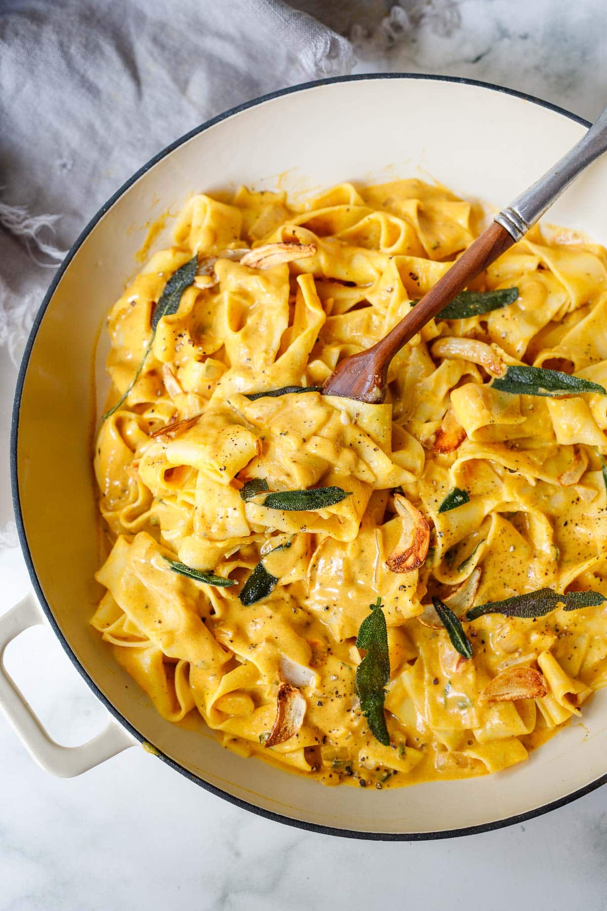 This Pumpkin Pasta recipe is made with simple ingredients in under 15 minutes. Deceptively vegan, it will soon become your new favorite!