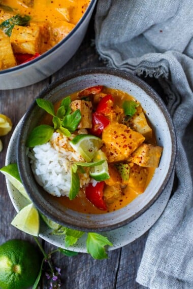 Creamy Pumpkin Curry is full of delicious Thai flavors that can be made with tofu, chicken or shrimp. Gluten-free, dairy-free, and great for meal prep!