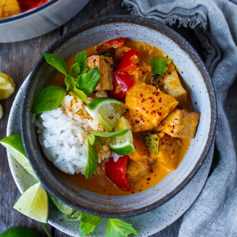 Creamy Pumpkin Curry is full of delicious Thai flavors that can be made with tofu, chicken or shrimp. Gluten-free, dairy-free, and great for meal prep!