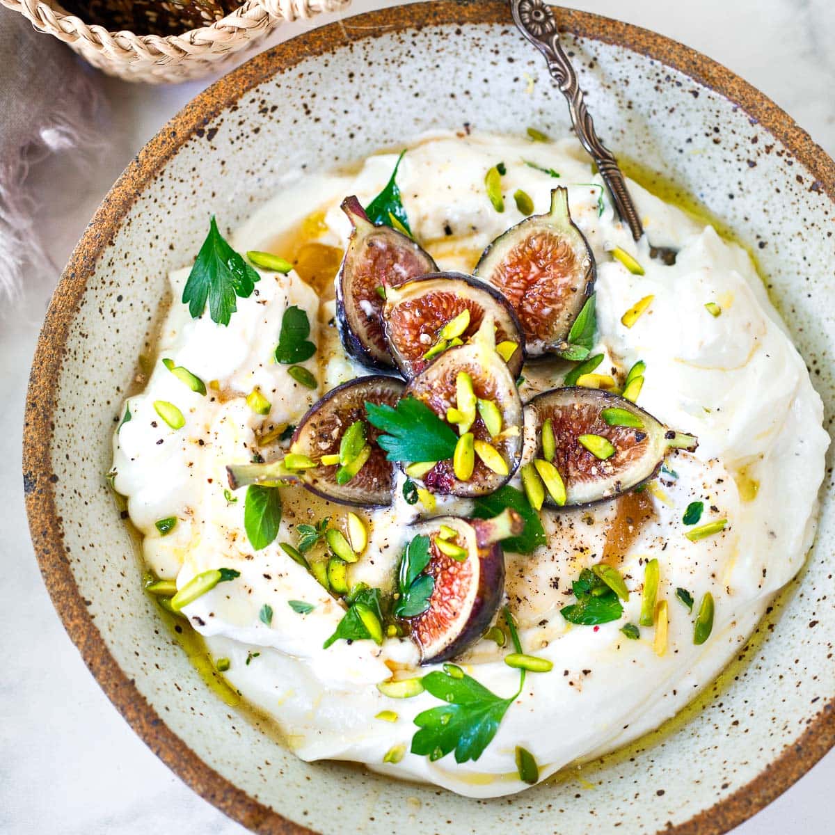 Whipped ricotta dip in a bowl.