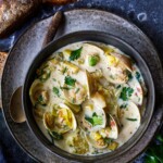 This Clam Chowder Recipe is made with fresh clams and their broth, Yukon gold potatoes, and melted leeks, a lightened-up version of New England-style clam chowder that is rich in flavor.