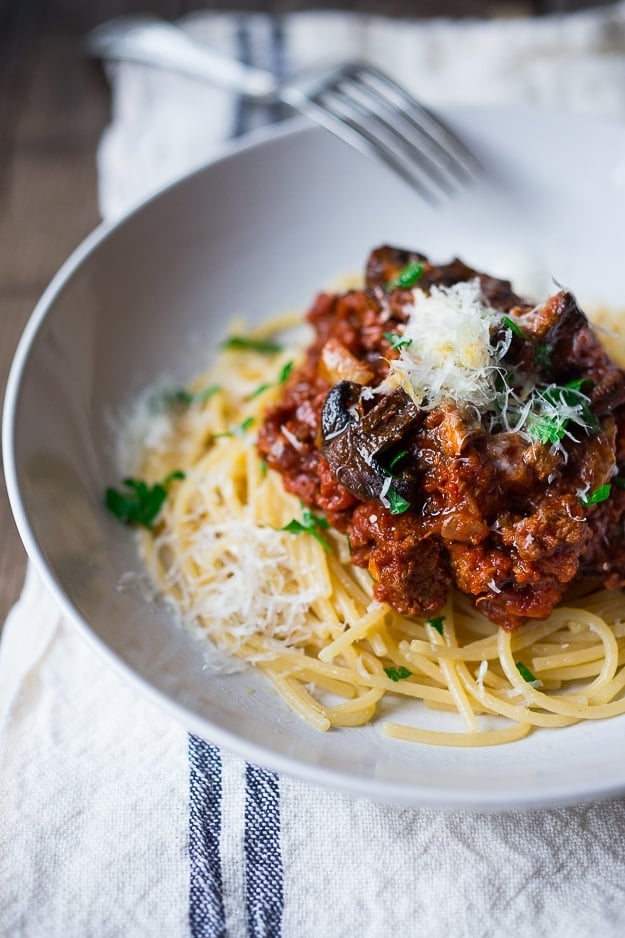 This Bolognese Sauce (aka Sunday Sauce) is hearty, robust and full of depth and flavor! Make it in a slow cooker, on the stovetop or in an Instant pot. We lighten it up with ground turkey (optional) and add mushrooms for extra umami. 