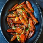 This simple Glazed Carrots recipe is a delightful addition to any meal, tender and succulent with just the right balance of sweet and tangy. Special enough for the holiday table and easy enough for weeknight dinners. Vegan-adaptable.