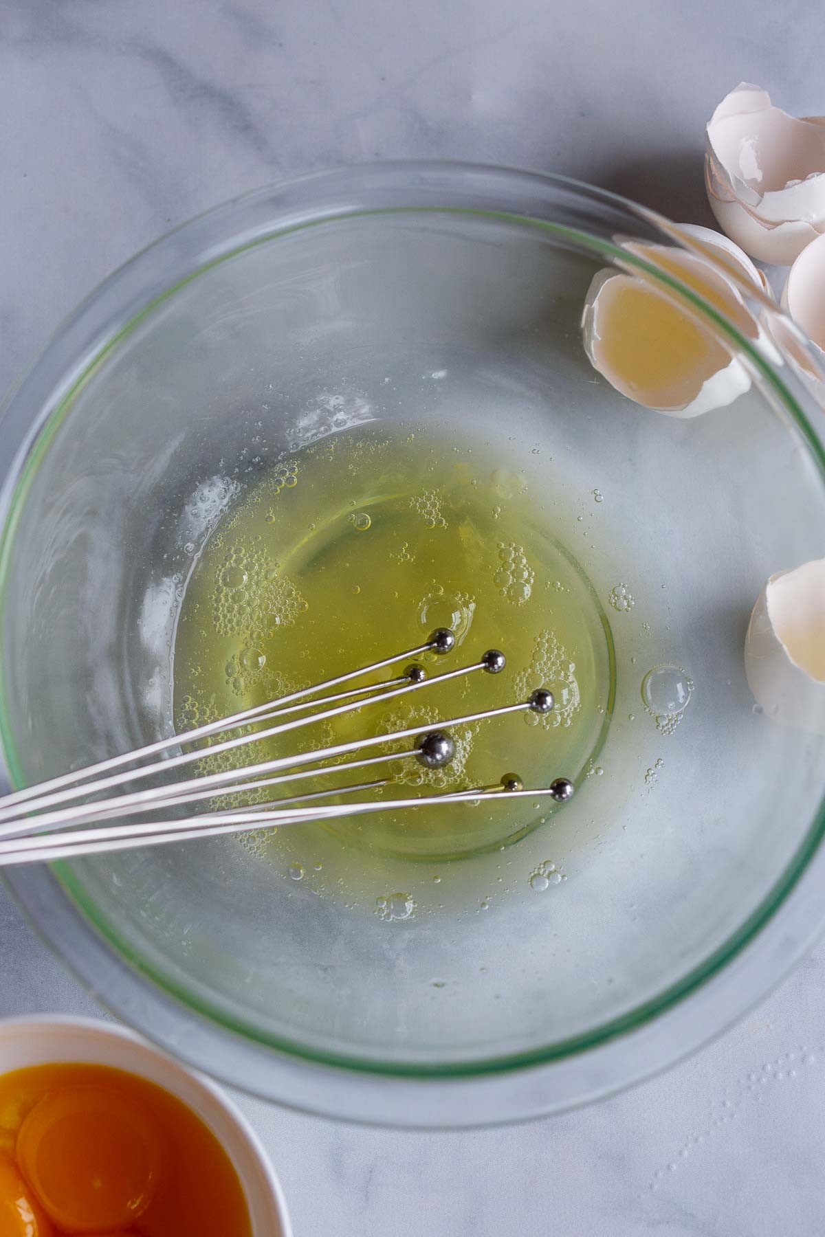 Mixing egg whites by hand, no need for a mixer.