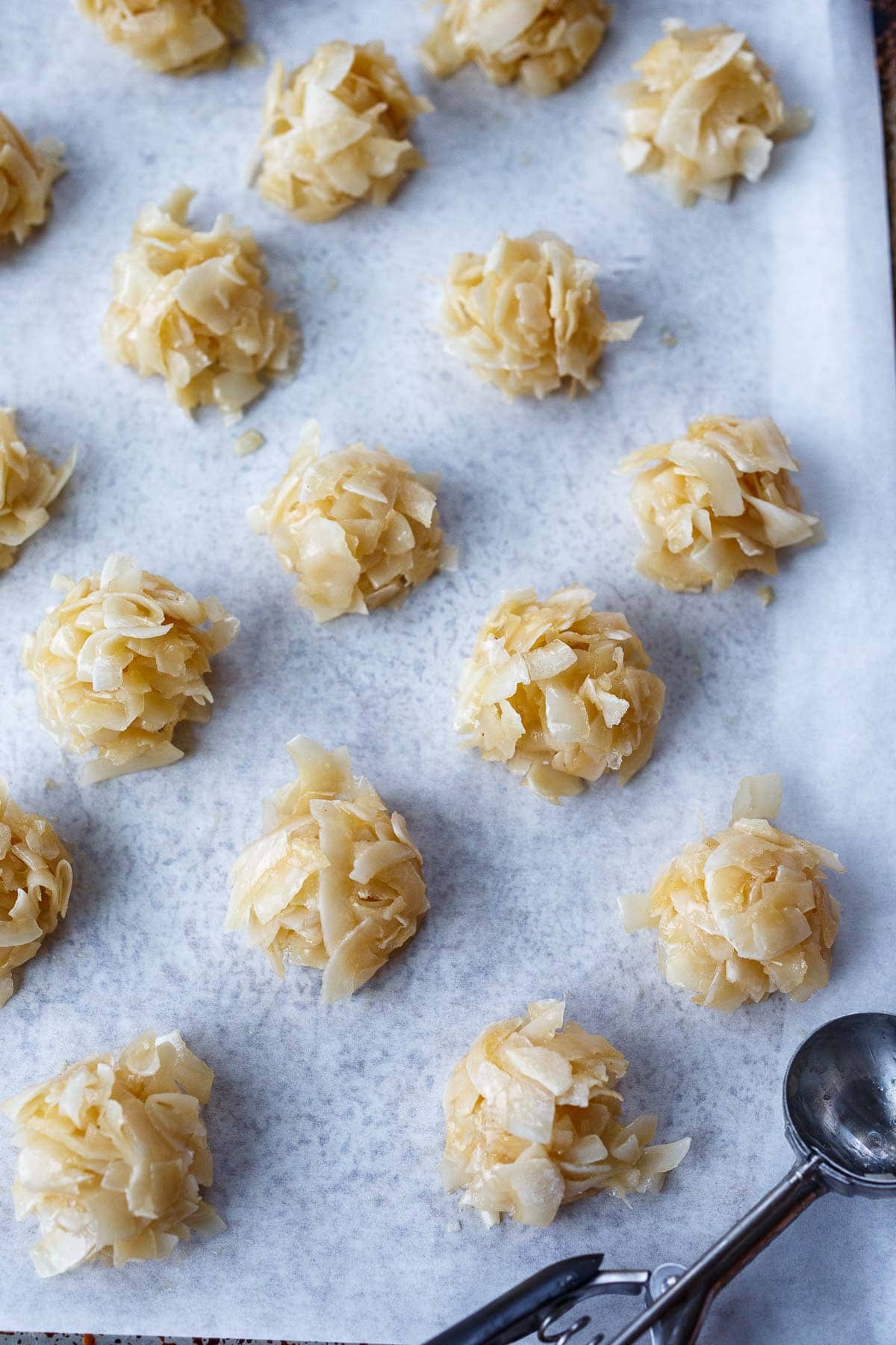 Macaroons on a sheet pan.