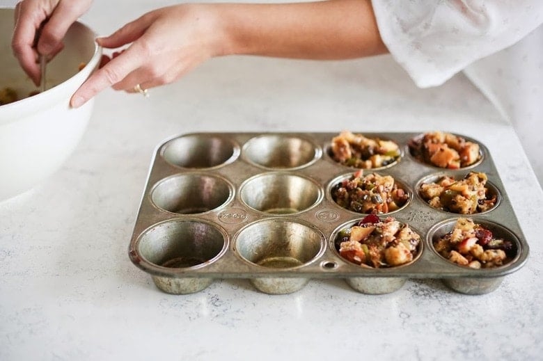 Delicious little bites, these Thanksgiving Stuffing Muffins make the perfect appetizer for your Thanksgiving day gathering. Easy, tasty! | www.feastingathome.com