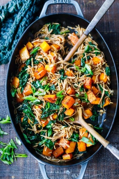 Asian Butternut Squash Noodles are the perfect fall meal! Roasted butternut with 5-spice, tossed with kale, soba noodles & stir-fry sauce.