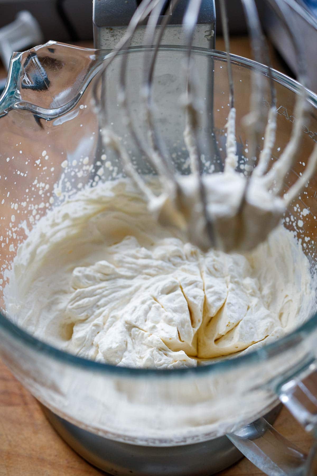 heavy cream, sugar, vanilla in stand mixer with whisk