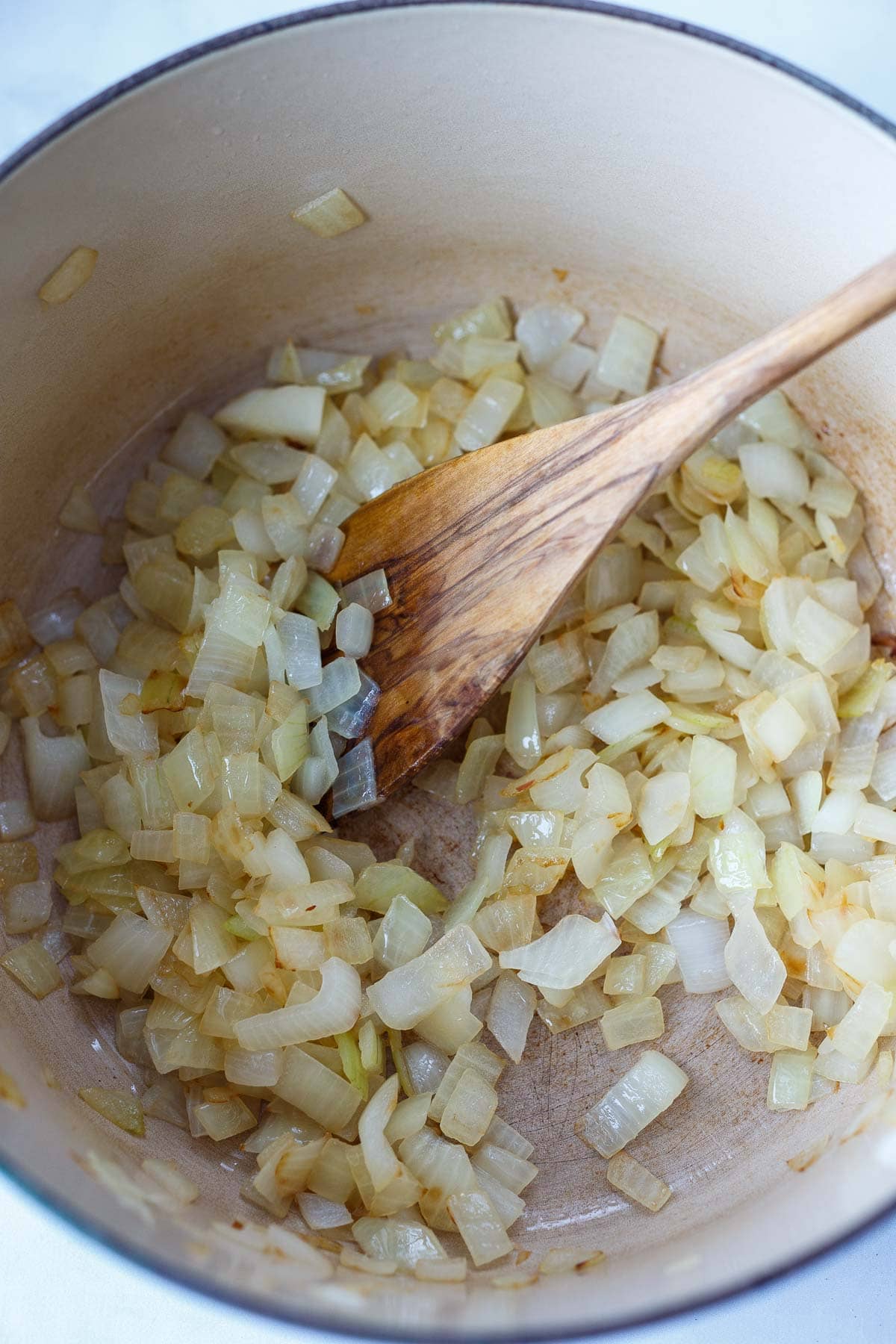 diced onion sauteing in pot.