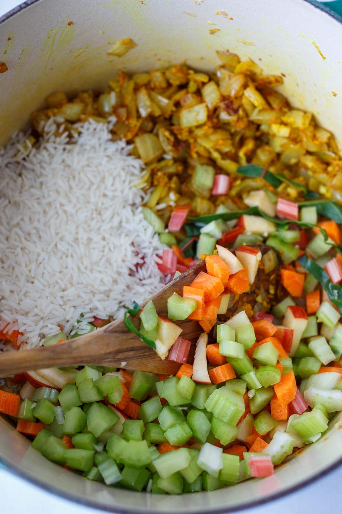 soup pot with diced celery, carrots, apples with Jasmine rice.